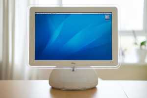 Gaze at the beauty of Liquid Glass on the sunflower iMac G4